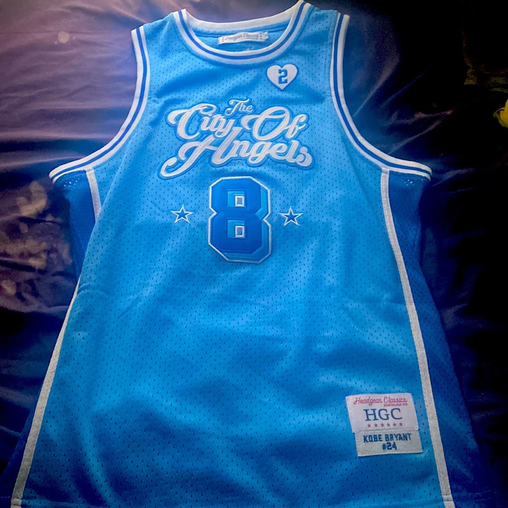Kobe jersey never worn eight in the front 24 in the back fit small men